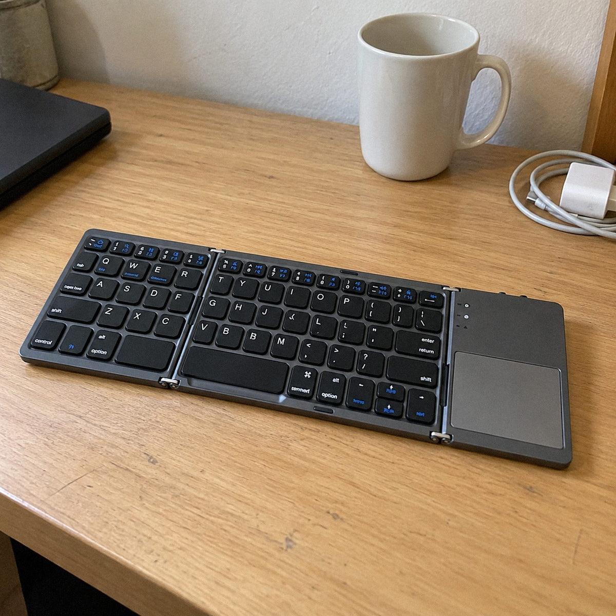 Dobra · Teclado Bluetooth dobrável com touchpad