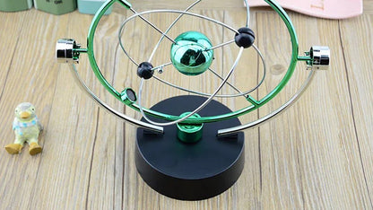 Órbita · Enfeite giratório de mesa